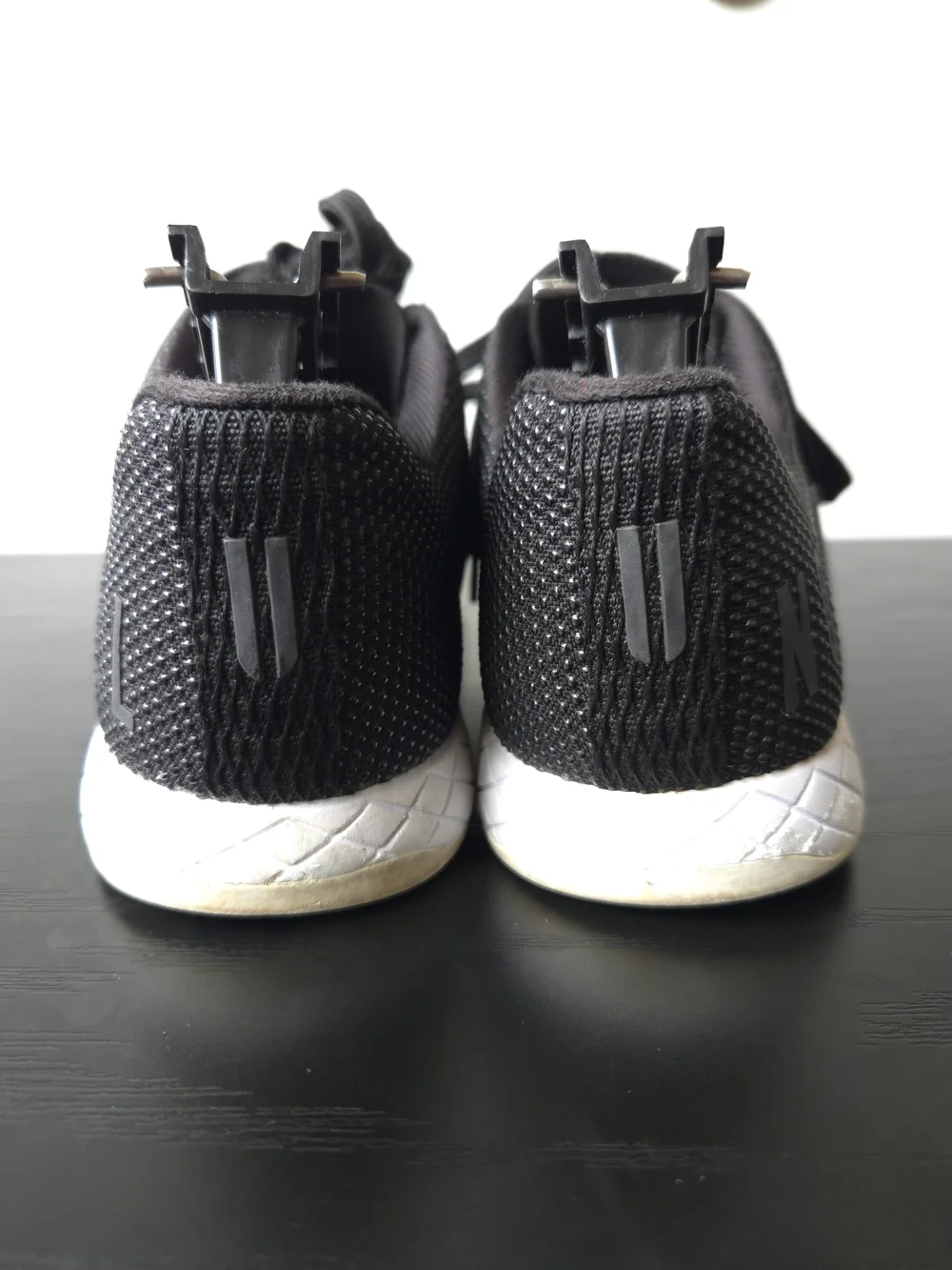 NOBULL Women's Low Top Outwork Black Athletic Shoes with White Midsole 5.5